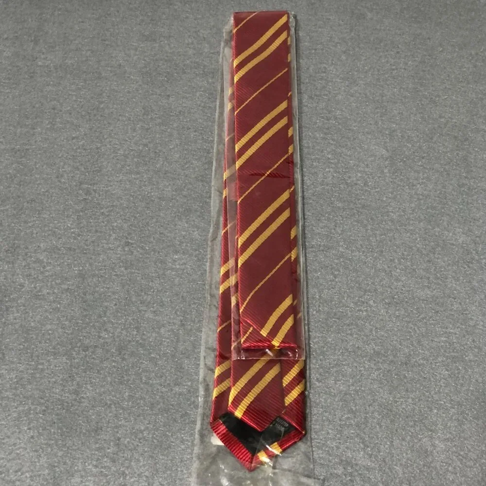 Hogwarts School Of Witchcrafts And Wizardly Note Book and uniform Tie